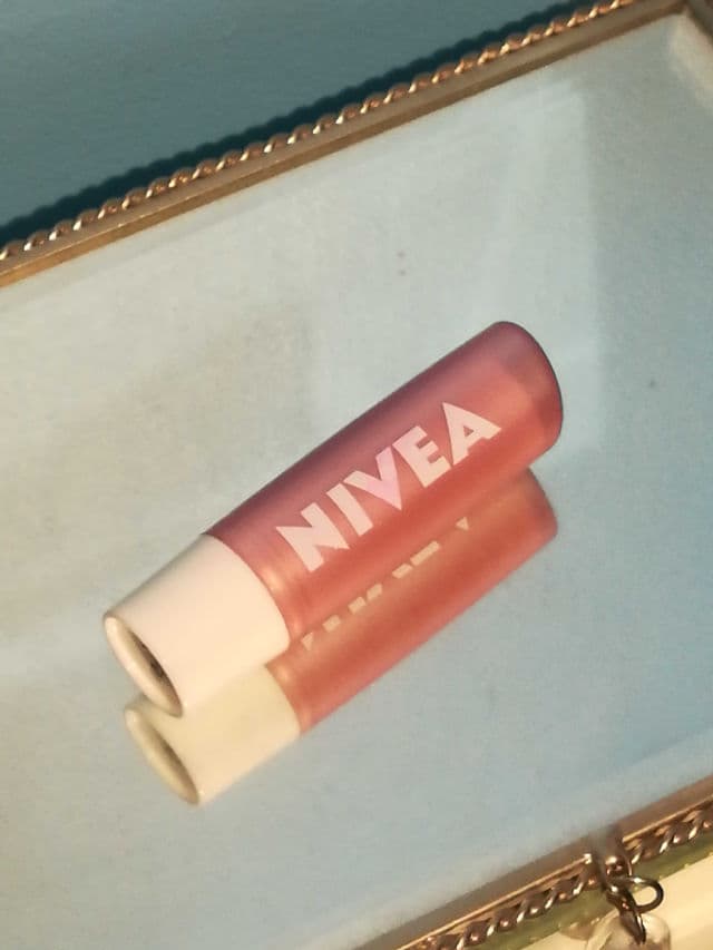 Nivea Pearly Shine Caring Lip Balm Stick review photo by thatskincarekid