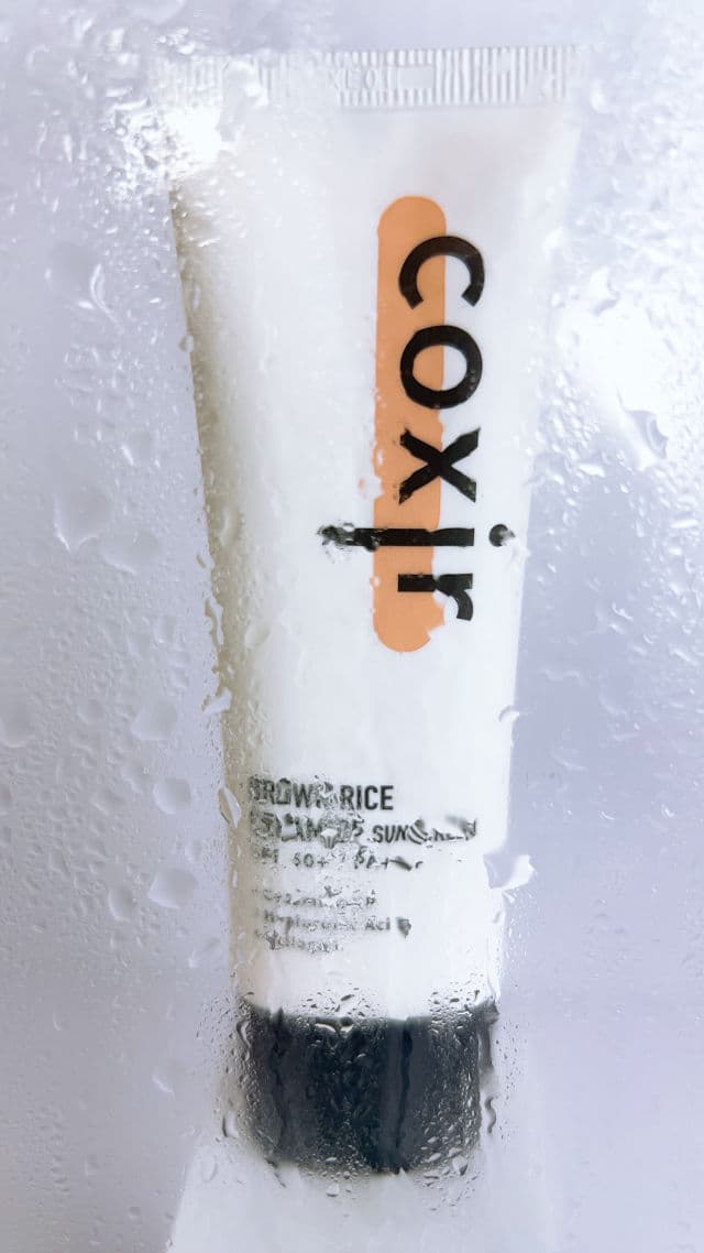 Coxir Brown Rice Ceramide Sunscreen SPF50+ PA+++ review photo by theskincaresagaa