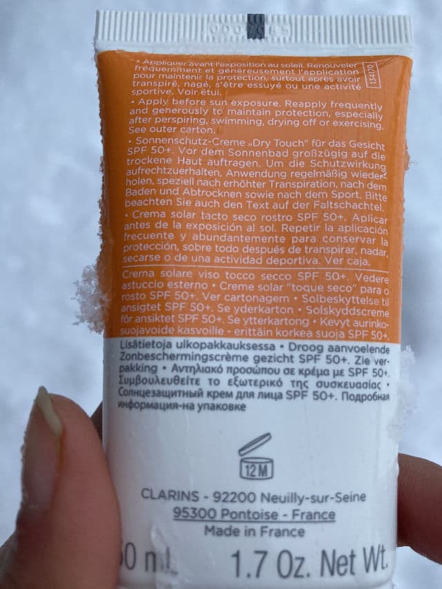 Clarins Dry Touch Facial Sun Care UVA/UVB 50+ review photo by anook